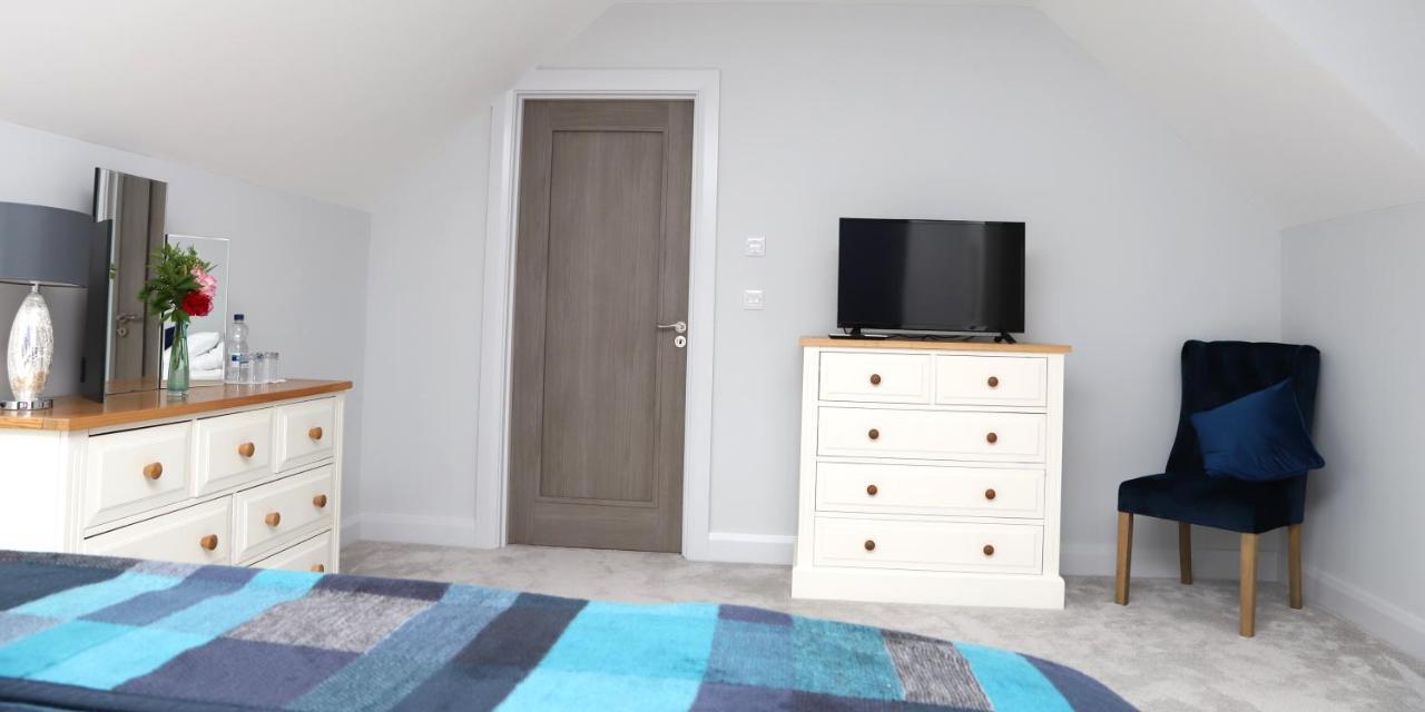 Dreibettzimmer mit Gartenblick